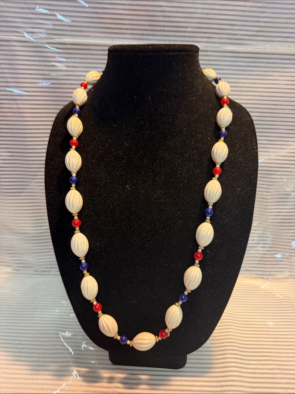 Source Unknown Cream Bead Necklace with Red and Blue Accents made in Hong Kong